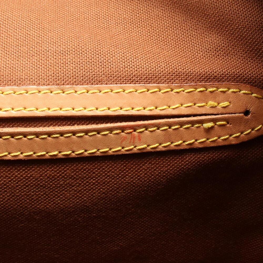 LOUIS VUITTON Brown Monogram Leather Backpack - Picture 6 of 13